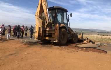 Katlehong residents use digger to tear up main road during protest