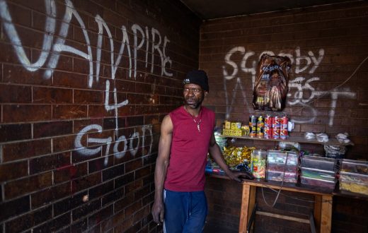 Families live with rubbish and rats in Joburg stadium