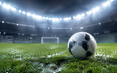 Generic football on a floodlit pitch